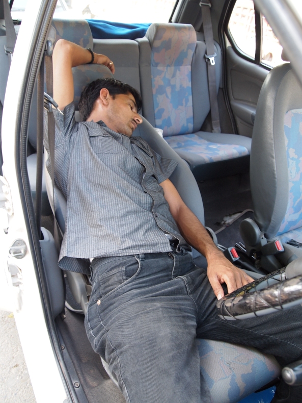 our surly driver Sanjay in Varanasi, napping