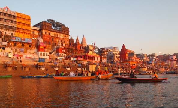 the sun rises over the ghats