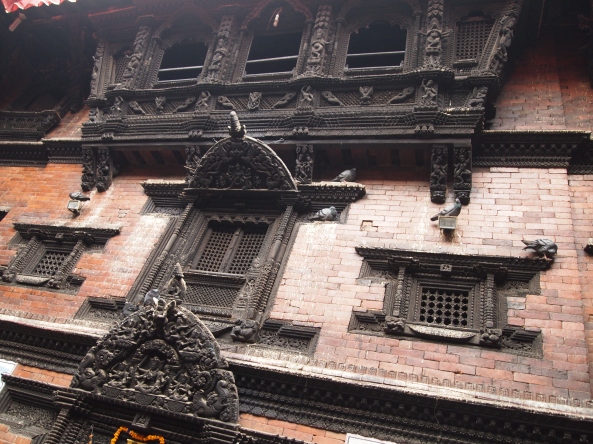 the exquisitely carved windows and doors of Kumari Chowk