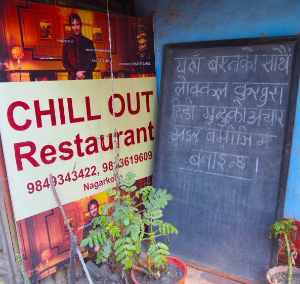 Chill Out Restaurant and Nepali writing on the blackboard